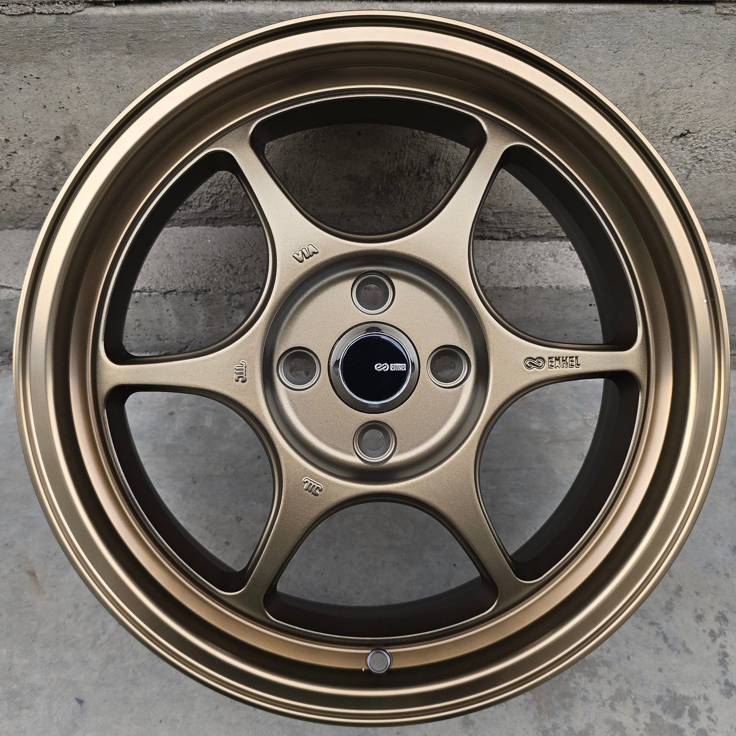 SET DE 4 LLANTAS ENKEI PF06. Aro 15 - 4x100. Color Bronce. (DX137)