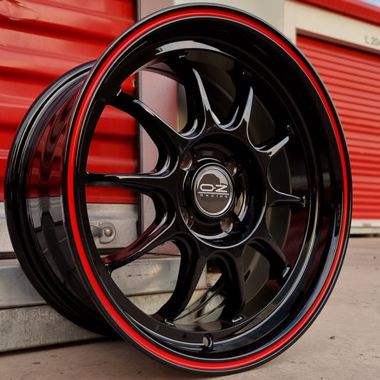SET DE LLANTAS OZ. Aro 15-4x100 .Color Negro Brillante Linea Roja .(15RT105C).