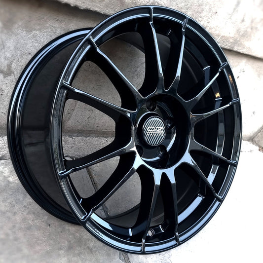 SET DE LLANTAS OZ ULTRA LIGERA COLOR Negro Brillante . Aro 18 - 5x120 (320)