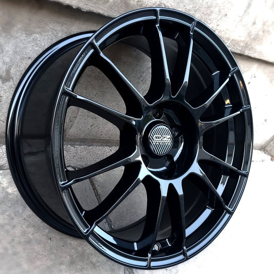 SET DE LLANTAS OZ ULTRA LIGERA  . Aro-18-5x108 .Color Negro Brillante .(320).