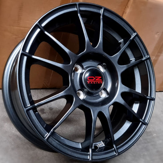 SET DE LLANTAS OZ ULTRA LIGERA. Aro 15-4x100 .Color Grafito .(AUTOHOME).