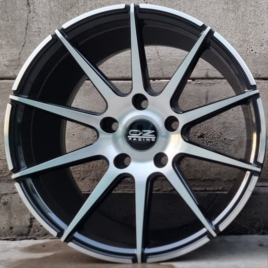 SET DE LLANTAS OZ ULTRA LIGERA. Aro 16 5x114. .Color Cromado Fondo Negro .(16N0184C).