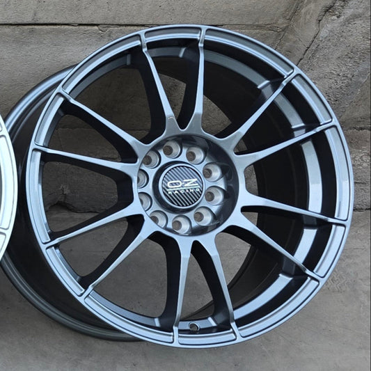 SET DE LLANTAS OZ ULTRA LIGERA. Aro 15-4x100, 4x108. Color Grafito. (320)