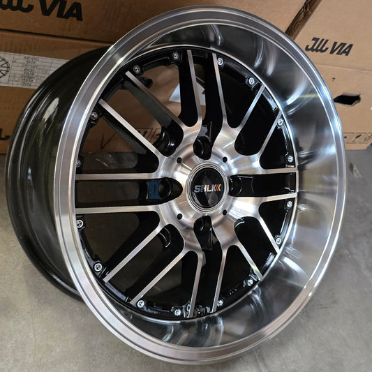 SET DE LLANTAS MODELO 1463. Aro 15-4x100 .Color Cromado Fondo Negro .(1463).