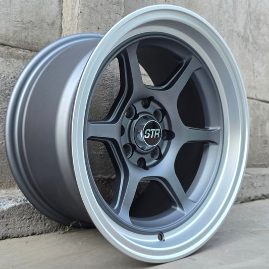 SET DE LLANTAS MODELO 668. Aro 15 - 4x100, 4x114. Doble Apernadura. Color Grafito Aro Cromado. (668)