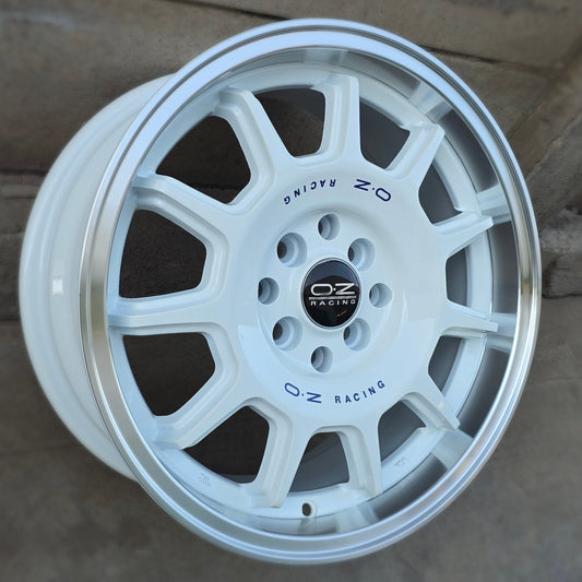 SET DE LLANTAS OZ Rally. Aro 16 - 5x100, 5x114. Doble apernadura. Color Blanco Aro Cromado (1006).