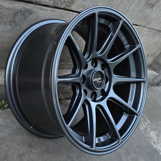 SET DE LLANTAS XXR 527. Aro 15 - 4x100, 4x114. Doble Apernadura. Color Grafito. (256).