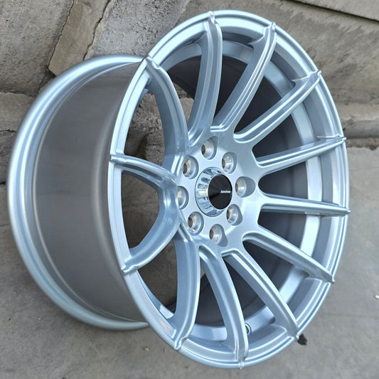 SET DE 4 LLANTAS CODIGO. Aro 15 - 4x100, 4x114. Doble Apernadura. Color Plateado. (AS25)