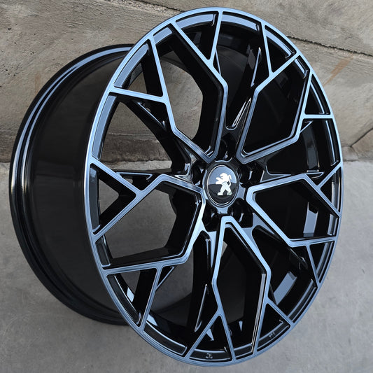 SET DE 4 LLANTAS PEUGEOT *. Aro 18 - 5x108. Color Titanio Fondo Negro. (TAMBURELLO)