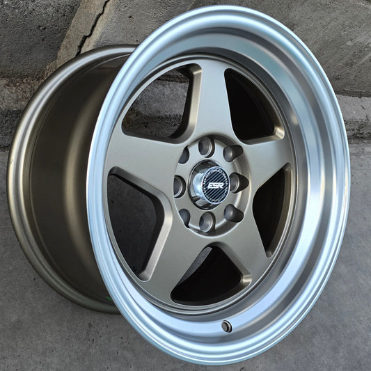 SET DE 4 LLANTAS ESR. Aro 15 - 4x100, 4x114. Doble Apernadura. Color Bronce Aro Cromado. (RGW5907)