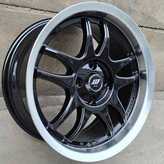 SET DE 4 LLANTAS WORK EMOTION. Aro 15 - 4x100. Color Negro Aro Cromado.(15H2052A)