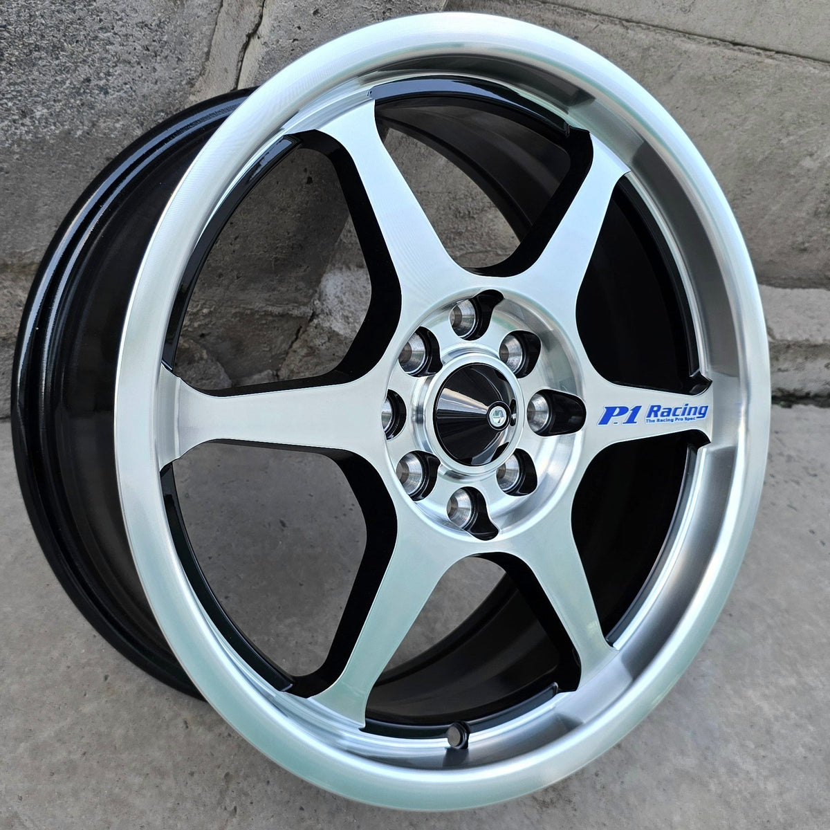 SET DE 4 LLANTAS P1. Aro 16 - 4x100, 4x114. Doble Apernadura. Color Grafito Metalizado. (L551)