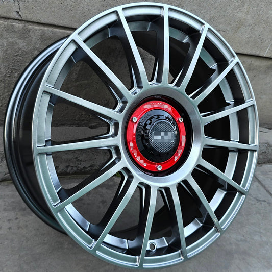 SET DE 4 LLANTAS Color Grafito Metalizado centro rojo. Aro 17- 5x100, 5x114. Doble apernadura. (F7728)