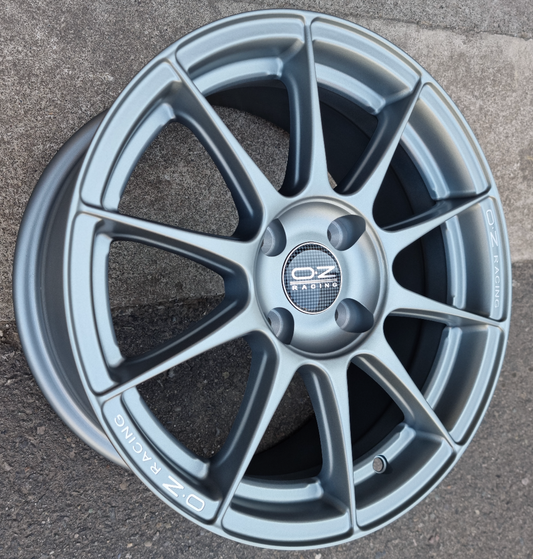 SET DE LLANTAS OZ RACING. Aro 15-4x100 .Color Grafito .(jh5186).