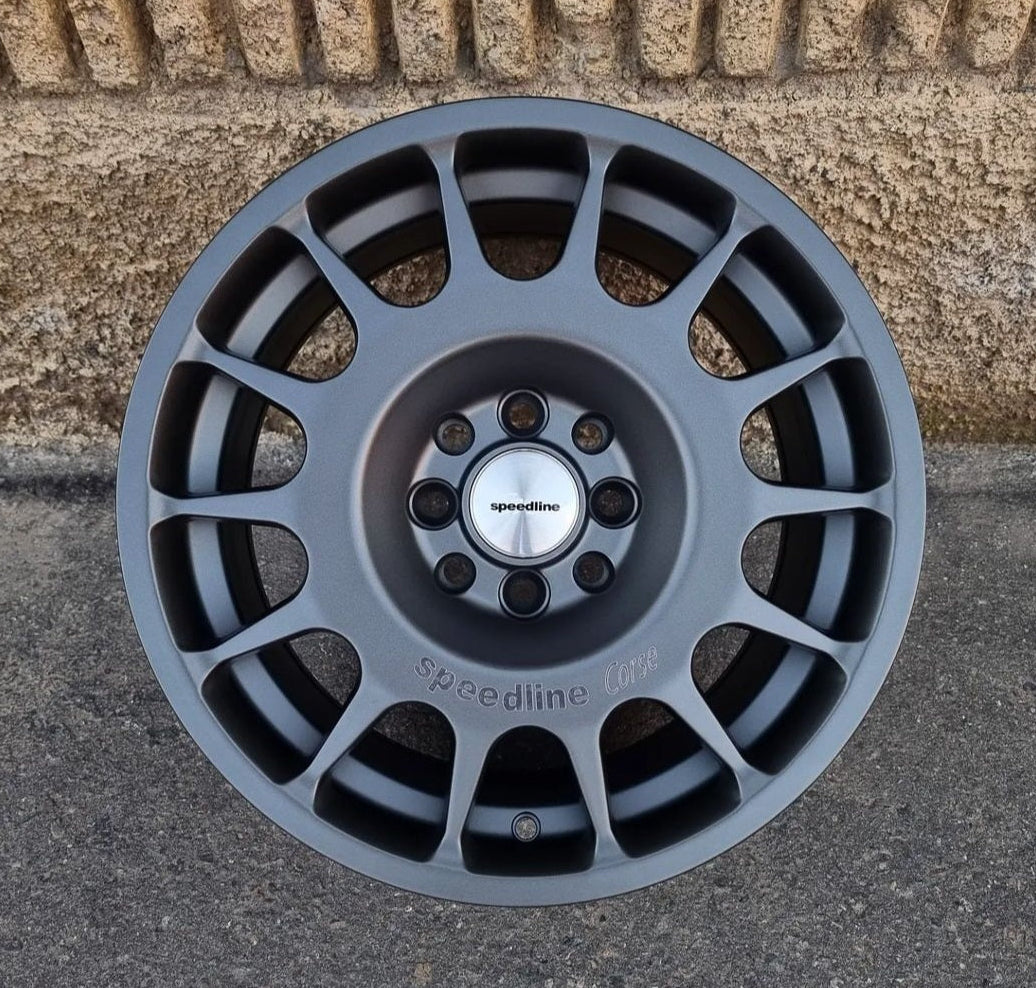 SET DE LLANTAS SPEED LINE. Aro 15-4x100, 4x108 .Color Grafito .(328).