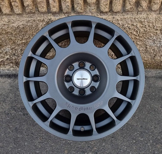 SET DE LLANTAS SPEED LINE. Aro 15-4x100, 4x108 .Color Grafito .(328).