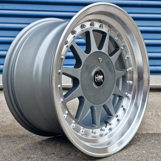 SET DE LLANTAS HEARTGE. Aro 15-4x100, 4x114 .Color Grafito Metalizado Aro Cromado .(H596).