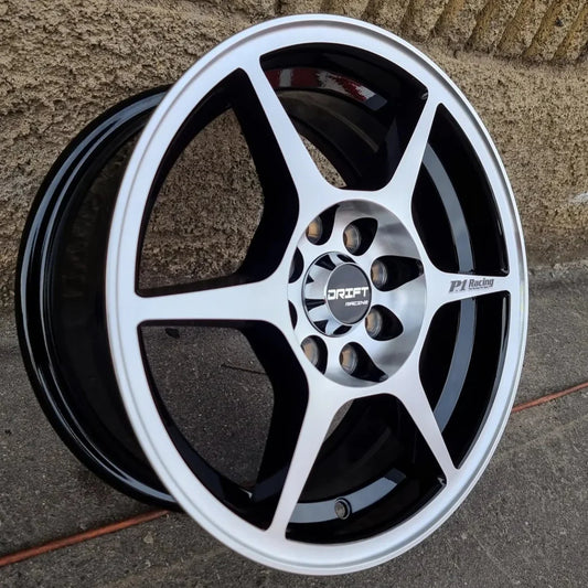 SET DE LLANTAS P1. Aro 14-4x108, 4x100. Doble apernadura. .Color Cromado Fondo Negro .(C011).