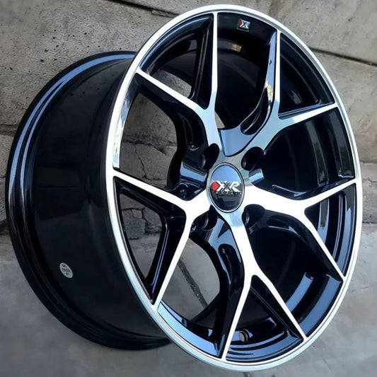 SET DE LLANTAS XXR. Aro 15-4x100 .Color Cromado Fondo Negro .(5049).