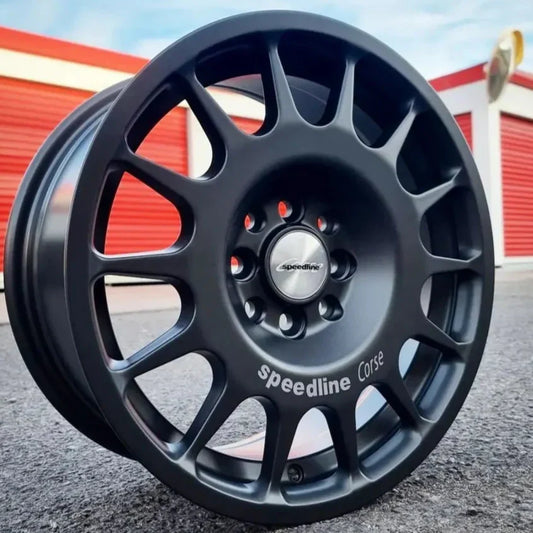 SET DE LLANTAS SPEED LINE. Aro 15-4x100, 4x108 .Color Grafito .(328).